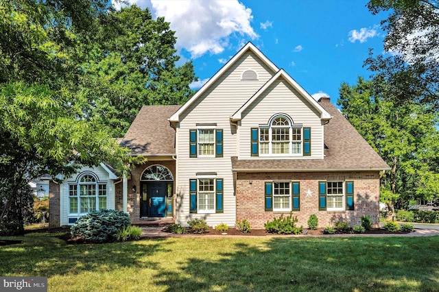 front of property with a front yard