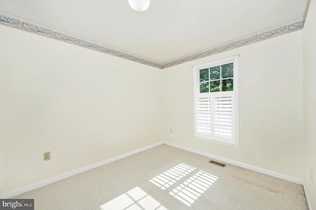 view of carpeted spare room