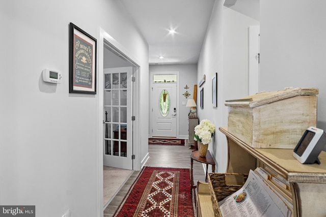 doorway to outside featuring hardwood / wood-style floors