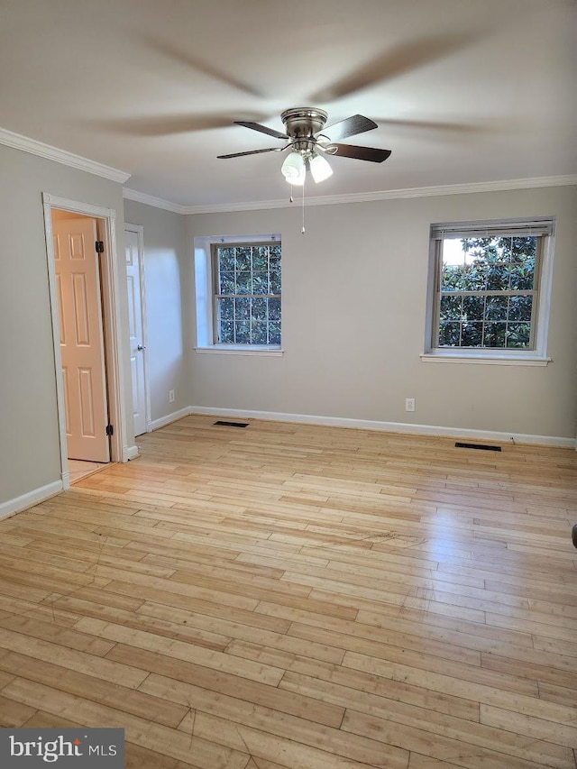 unfurnished room with ceiling fan, ornamental molding, and light hardwood / wood-style flooring