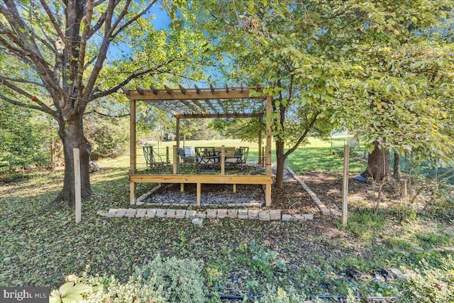 exterior space with a pergola