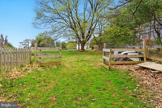 view of yard featuring fence