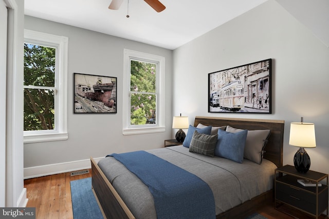 bedroom featuring ceiling fan and hardwood / wood-style floors