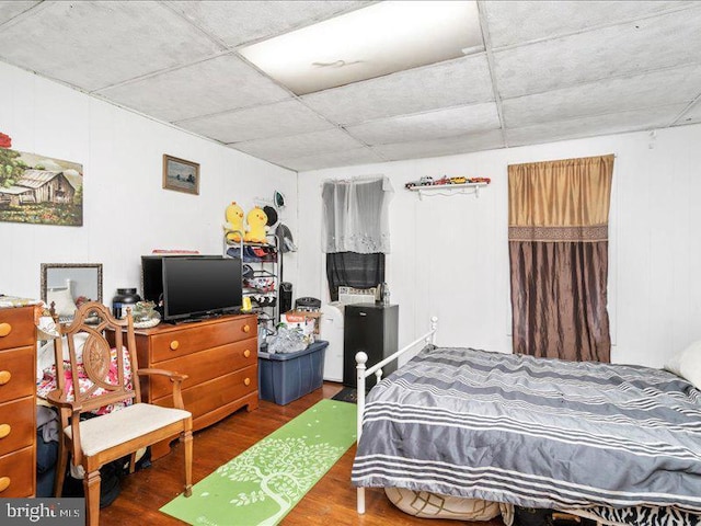 bedroom featuring wood-type flooring