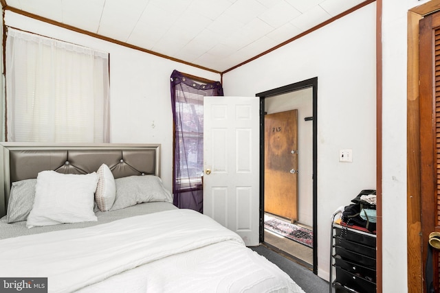 bedroom with ornamental molding