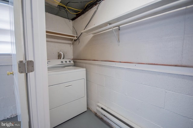 clothes washing area featuring washer / dryer