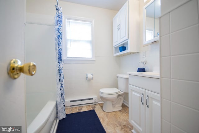 full bathroom featuring toilet, vanity, tile walls, shower / bath combination with curtain, and a baseboard radiator