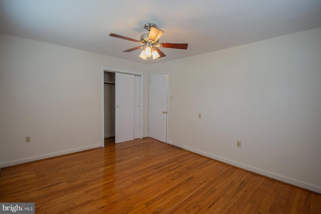 unfurnished bedroom featuring ceiling fan and wood-type flooring