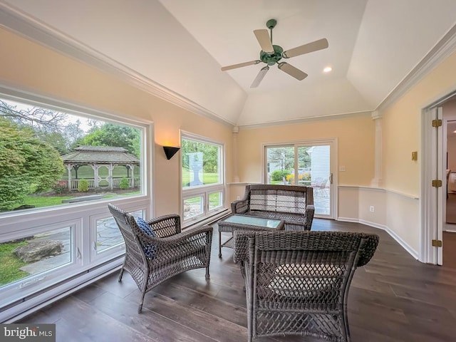 sunroom / solarium with vaulted ceiling and ceiling fan