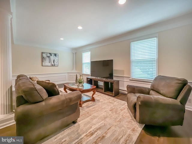 living room with light hardwood / wood-style flooring