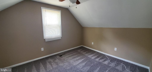 bonus room with carpet floors, lofted ceiling, and ceiling fan