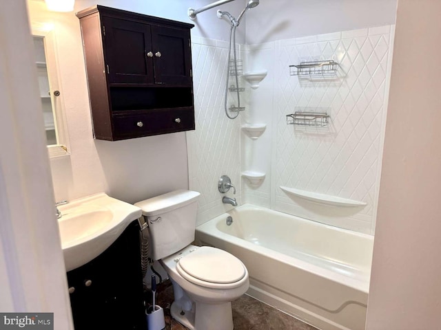 full bathroom with toilet, tiled shower / bath, and vanity