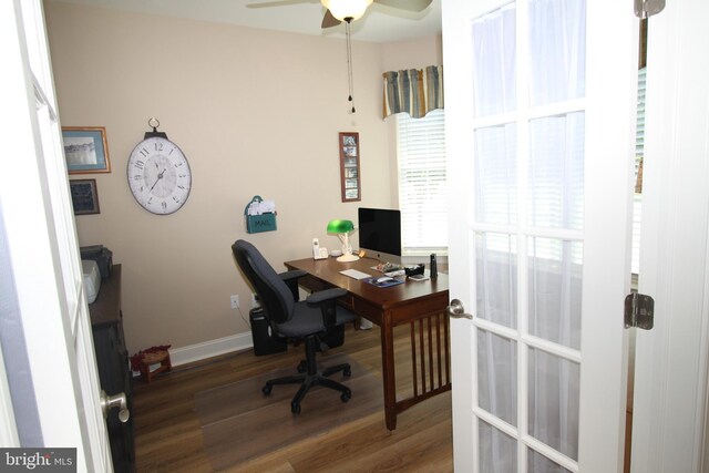 home office featuring wood finished floors, baseboards, and ceiling fan