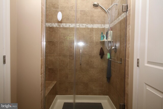 bathroom with a stall shower