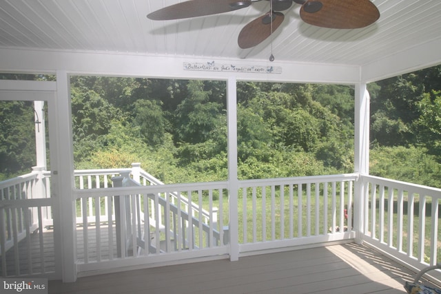 wooden terrace with ceiling fan