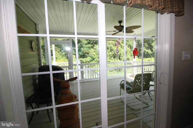 exterior space with plenty of natural light and ceiling fan