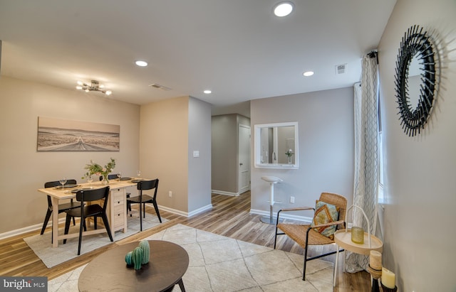 dining room with light wood-type flooring