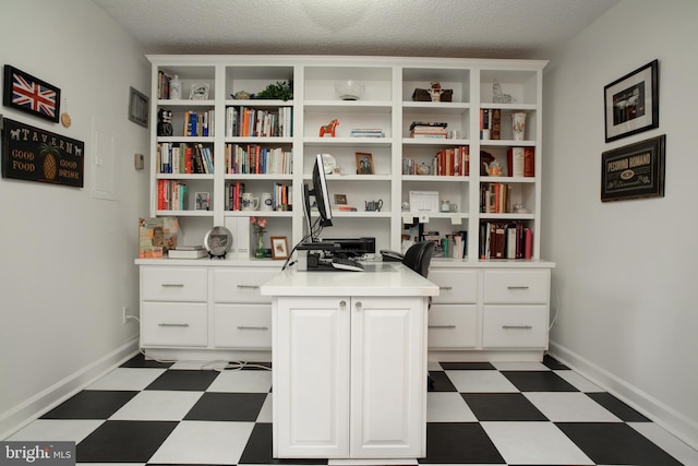 office space featuring a textured ceiling