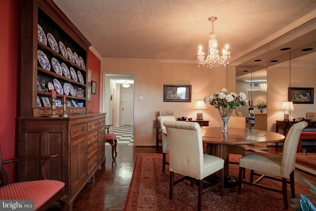 dining space with ornamental molding, dark parquet flooring, a chandelier, and a textured ceiling