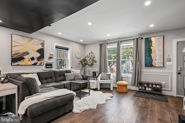 living room with dark wood-type flooring