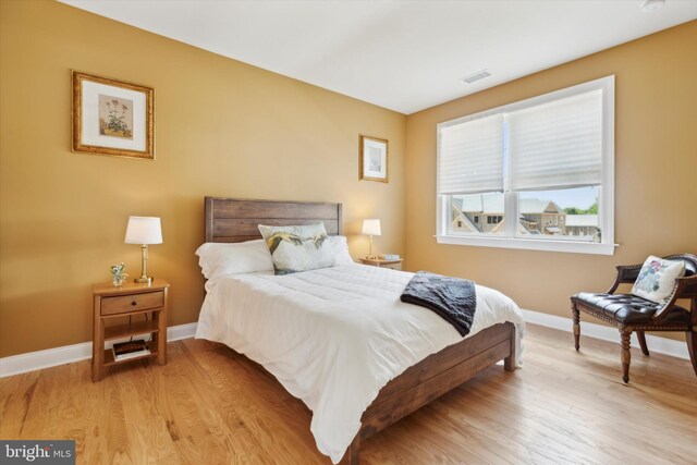 bedroom featuring light hardwood / wood-style floors