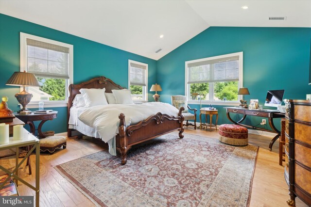 staircase with hardwood / wood-style floors