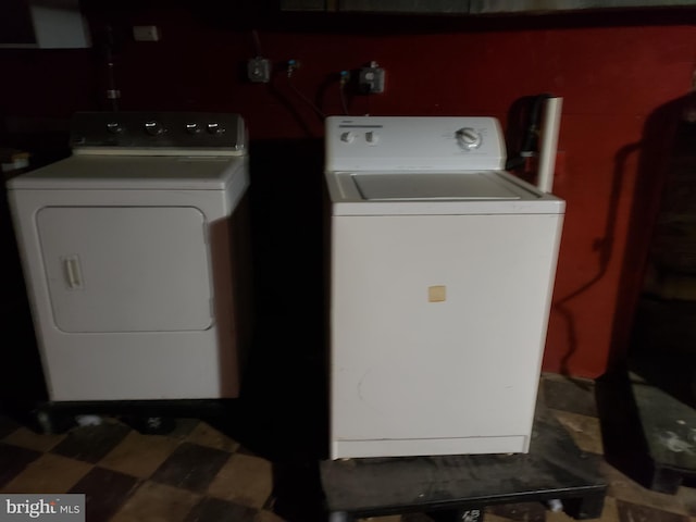 laundry area with washing machine and dryer