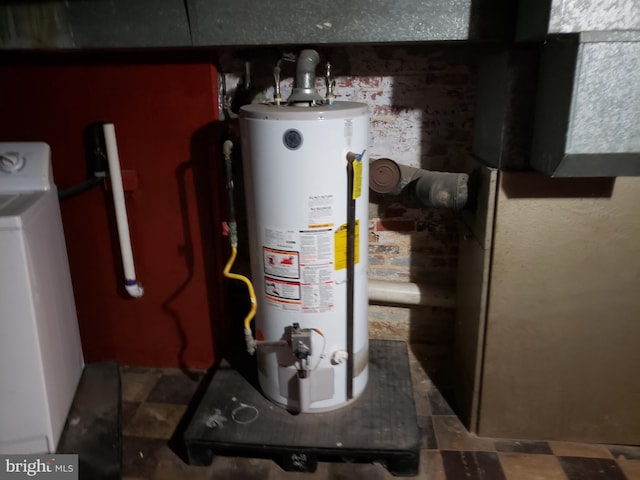 utility room with washer / dryer and gas water heater