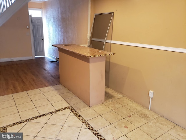 interior space with light tile patterned flooring