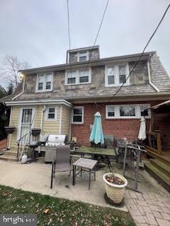 rear view of property with a patio