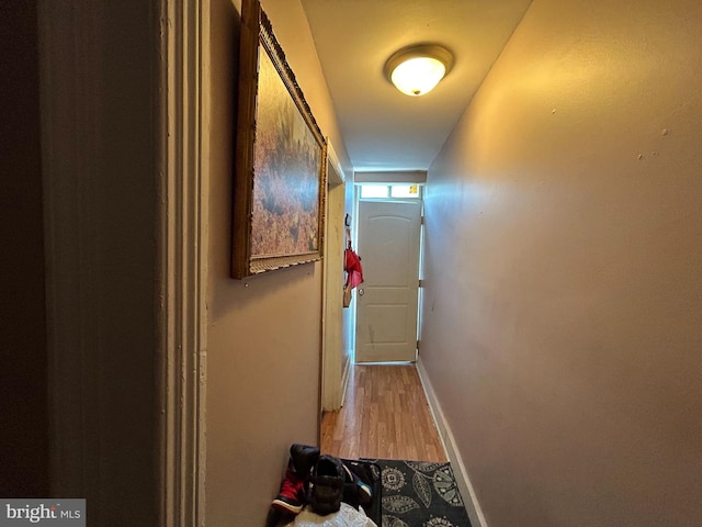 hallway with light wood-type flooring