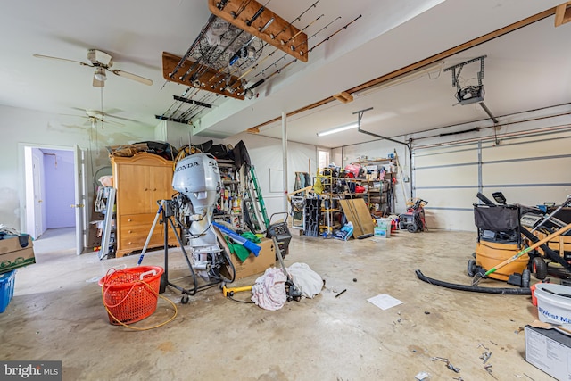 garage with ceiling fan and a garage door opener