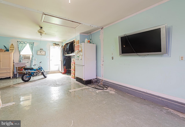 garage with white refrigerator