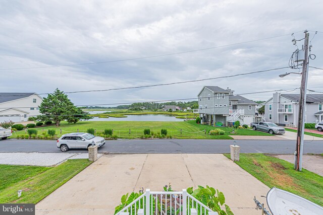 view of yard with a water view