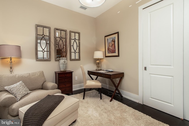 living area featuring hardwood / wood-style flooring