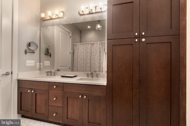 bathroom with vanity and a shower with shower curtain