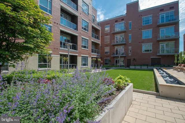 exterior space featuring a lawn