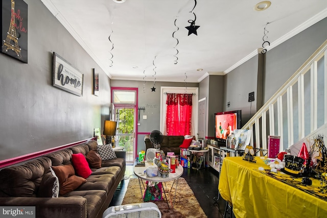 living room with ornamental molding