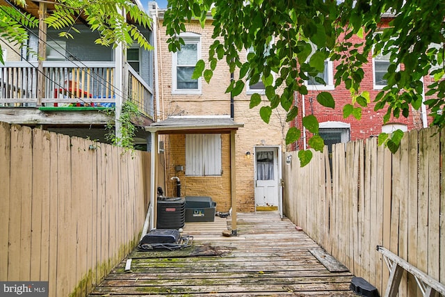 property entrance with a deck