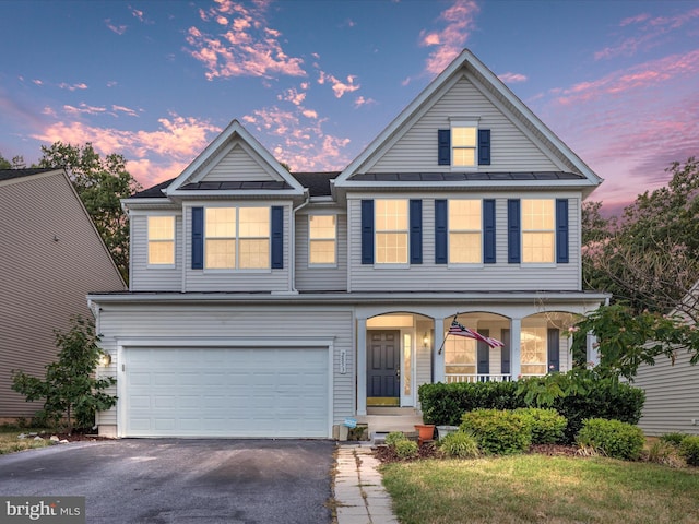 view of front of house with a garage