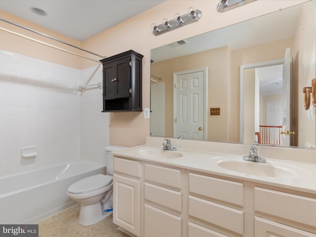 full bathroom featuring shower / bathtub combination, vanity, toilet, and tile patterned floors