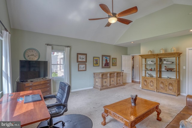 office with light carpet, ceiling fan, and high vaulted ceiling