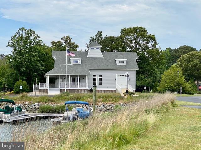 back of house with a porch