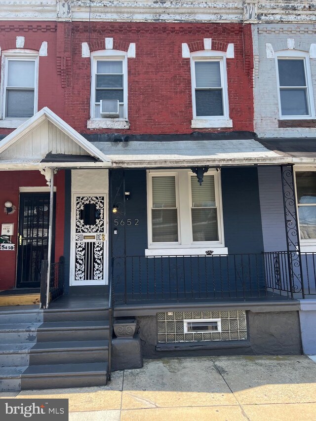 view of front of property with cooling unit