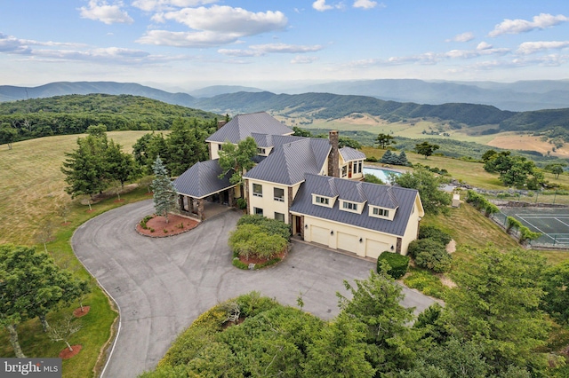 bird's eye view with a mountain view