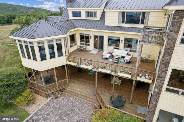 carpeted bedroom with access to outside and ceiling fan