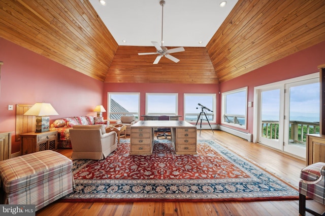 living room with a fireplace, light hardwood / wood-style floors, a wealth of natural light, and wooden ceiling