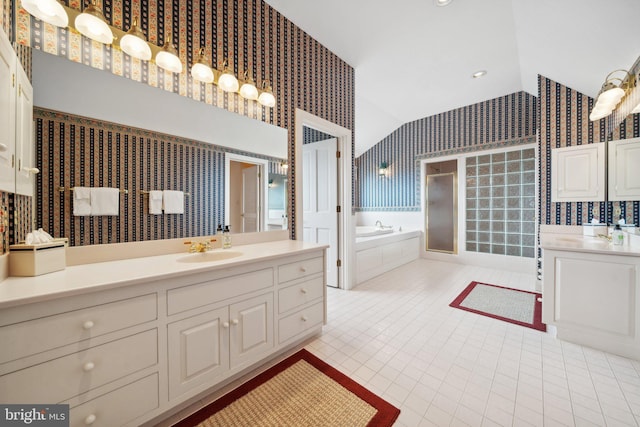 bathroom featuring tile patterned floors, vanity, a baseboard heating unit, and toilet