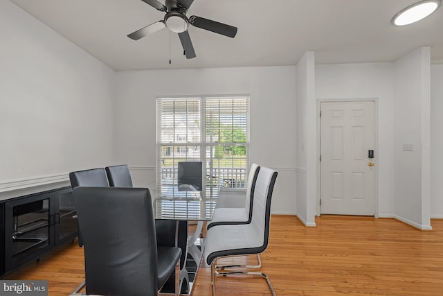 dining space featuring ceiling fan and light hardwood / wood-style floors