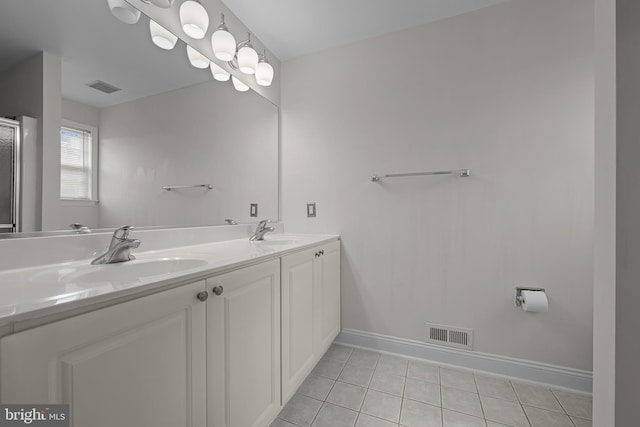 bathroom featuring vanity and tile patterned flooring